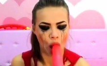 Cam girl face fucks and gags her self hard
